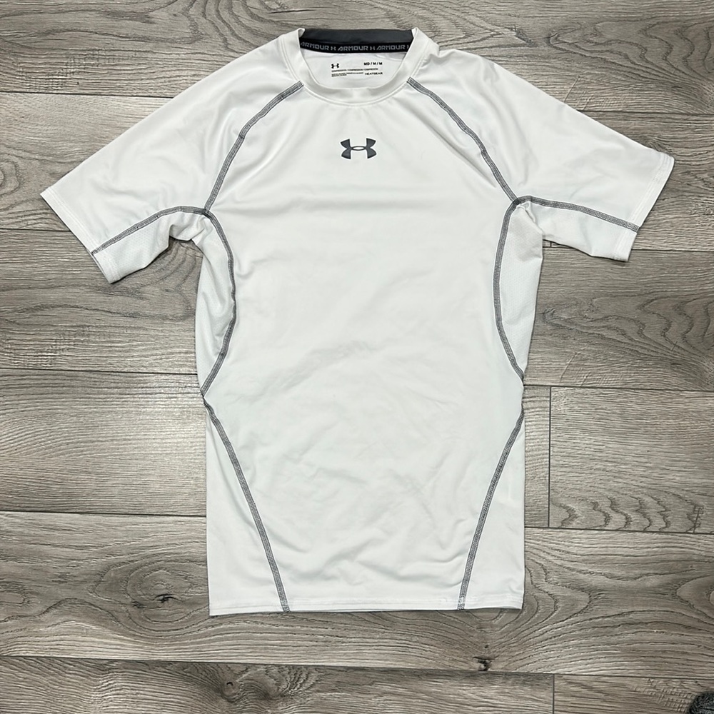 White and grey men’s medium Under Armour Compression heat gear tee shirt